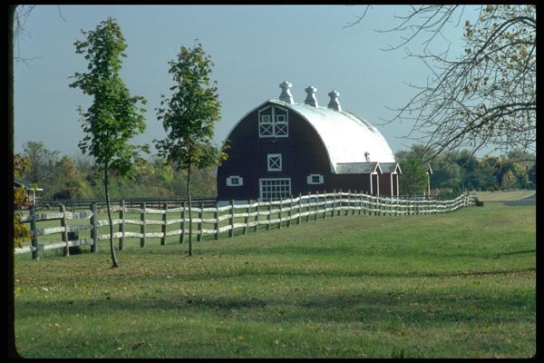 097053 Red And White Arch Roofed Barn A4 Photo Print