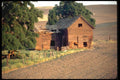 097055 Dilapidated Barn In Plowed Fields A4 Photo Print