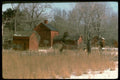 097063 Red Farm Buildings In First Snow A4 Photo Print
