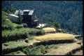 097077 Rustic House On Terraced Hillside A4 Photo Print
