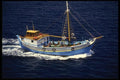 118008 Colorful Trawler Heads Towards Mykonos A4 Photo Print