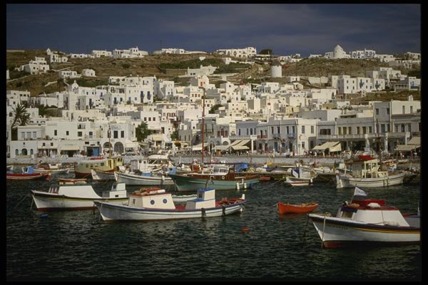 118016 Main Harbor Contrasts Blue Water, White Buildings A4 Photo Print