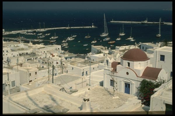 118022 Whitewashed Chapels, Homes, Shops And Inns Meet Wall To Wall A4 Photo Print