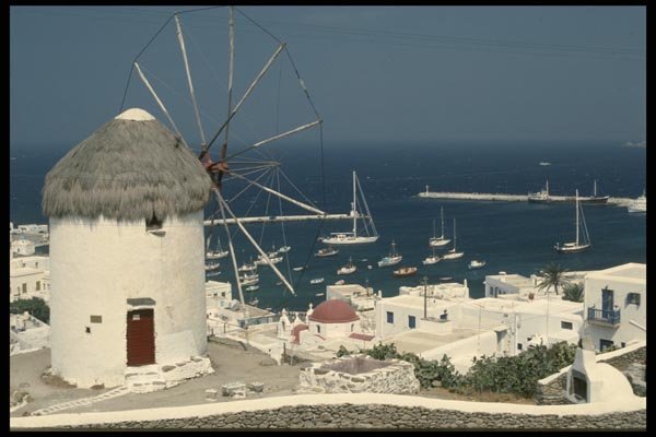 118028 Harbor Views Usually Include A Restored Windmill A4 Photo Print