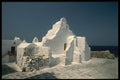 118036 Whitewashed Chapel At Edge Of Aegean A4 Photo Print