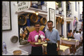 118043 Mykonos Wine, Pasta And Friendly Service A4 Photo Print