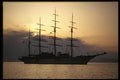 118049 The Sun Sets Behind The Anchored Schooner A4 Photo Print