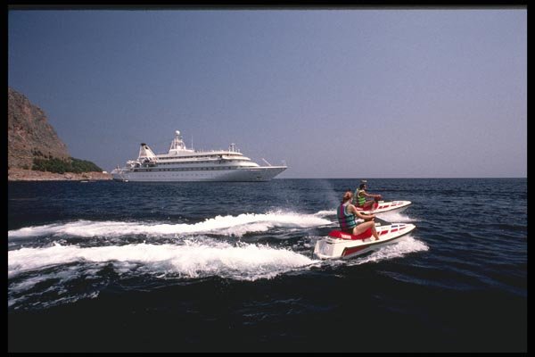 118052 Watersports Are Fun In Monemvasia's Tranquil Bay A4 Photo Print