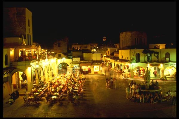 118069 The Main Square Attracts Crowds Day And Night A4 Photo Print