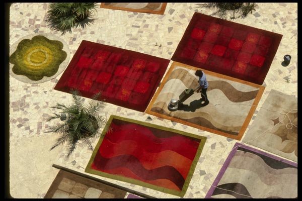 122042 Cleaning Carpets On Hotel Patio A4 Photo Print