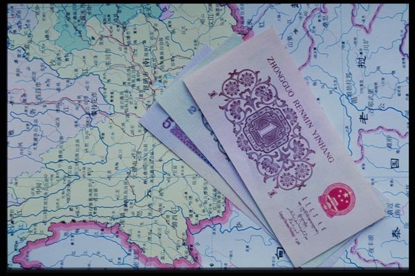 125032 Chinese Bills On Map Of China A4 Photo Print