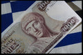 125047 Greek Bill On Greek Flag A4 Photo Print