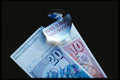 125065 Swiss Bills With Magnifier A4 Photo Print