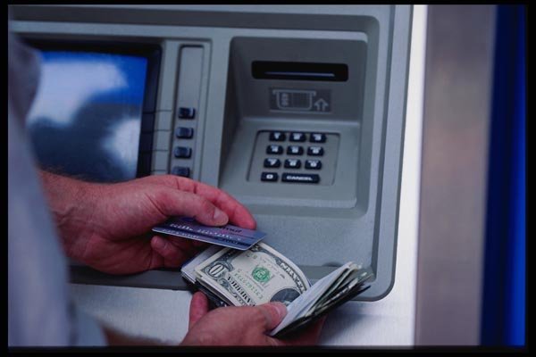 125090 Getting Cash At The Bank Machine A4 Photo Print