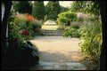 131099 View Through Archway To Established Garden A4 Photo Print