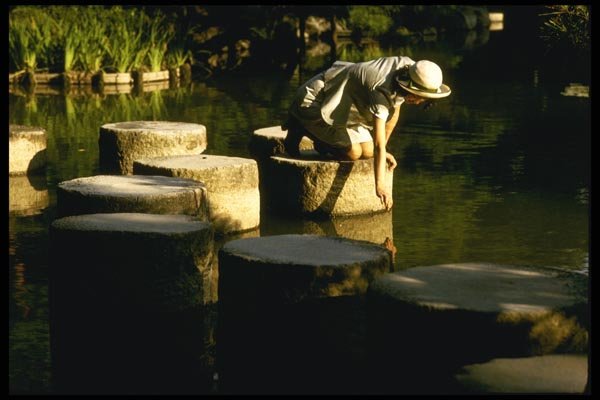 145033 Visitor On Stone Pathway Across Heian Shrine Pond A4 Photo Print