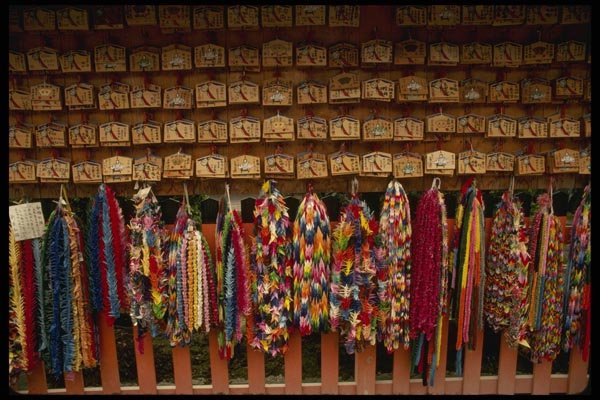 145044 Strings Of Folded Paper Cranes And Wooden Amulets A4 Photo Print