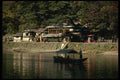 145083 A Serene Boat Ride On Arashiyama Pond A4 Photo Print
