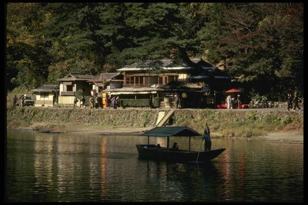 145083 A Serene Boat Ride On Arashiyama Pond A4 Photo Print