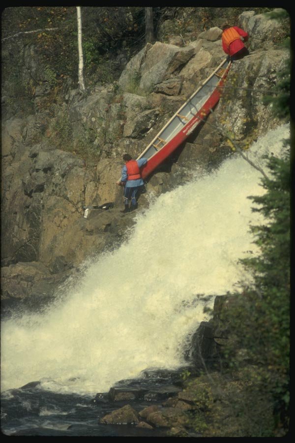 155060 Canoe By Waterfall Quebec A4 Photo Print