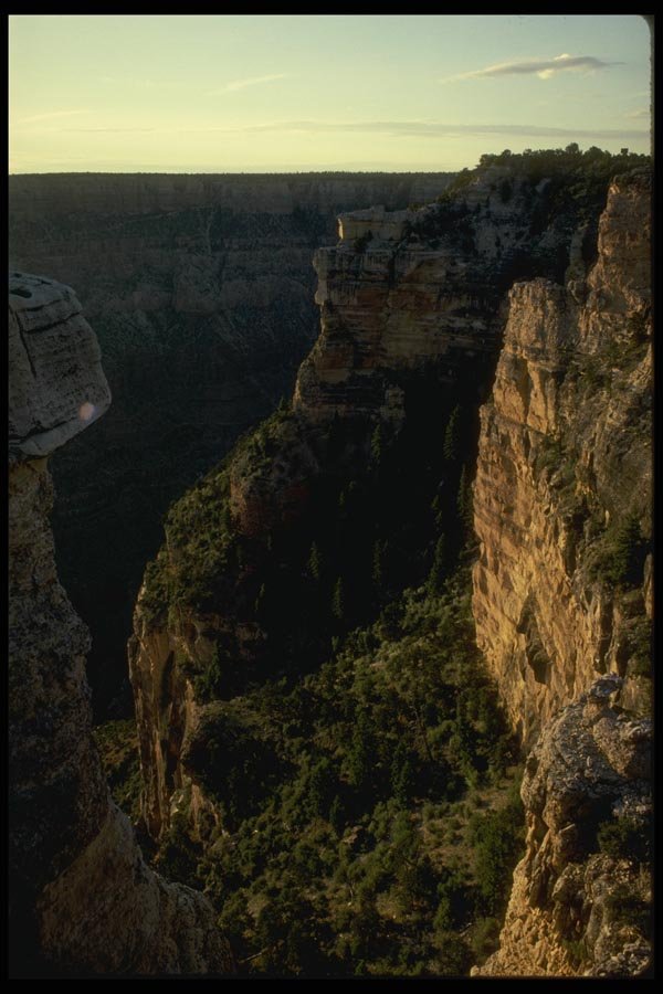 162081 Early Sunlight On Cliffs A4 Photo Print