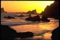 178016 Sunset Behind Rocks At Ocean A4 Photo Print