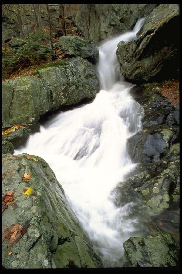 178047 Waterfall Through Rocks A4 Photo Print