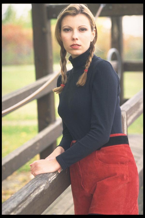 181065 Sandra Against Fence A4 Photo Print