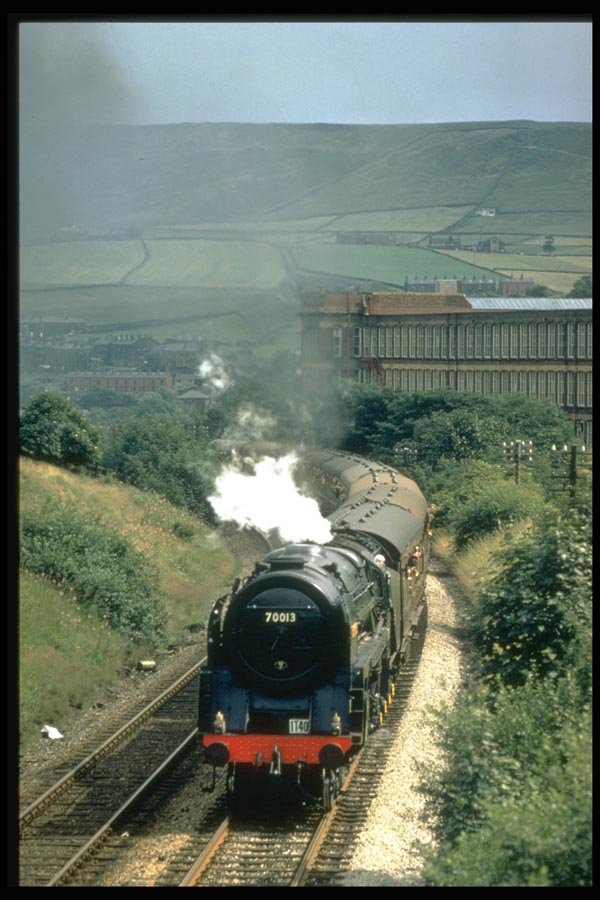 182003 The Cotton Mill At Todmorden Forms The Backdrop For No. 70013 A4 Photo Print