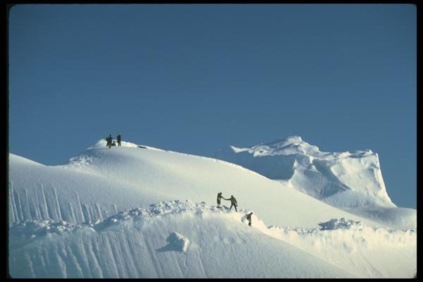184059 People Climbing Iceberg A4 Photo Print