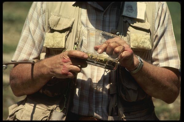 185055 Angler Selects New Fly A4 Photo Print