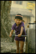 187002 Young Boy At Village Water Tap A4 Photo Print