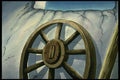 193034 Wagon wheel Resting Under Window Of Hut A4 Photo Print