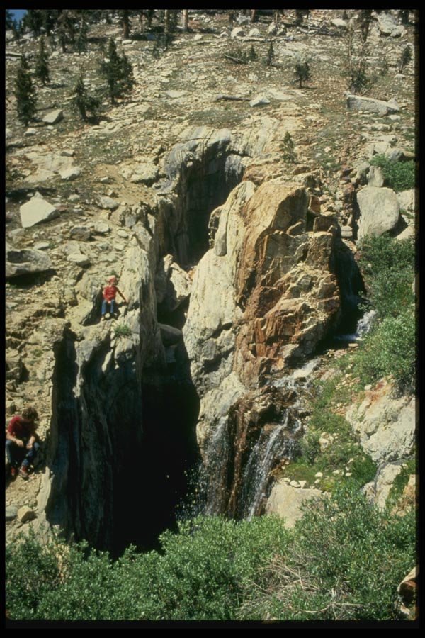 194015 Stream Goes Underground In Alpine Cave, California Sierras A4 Photo Print