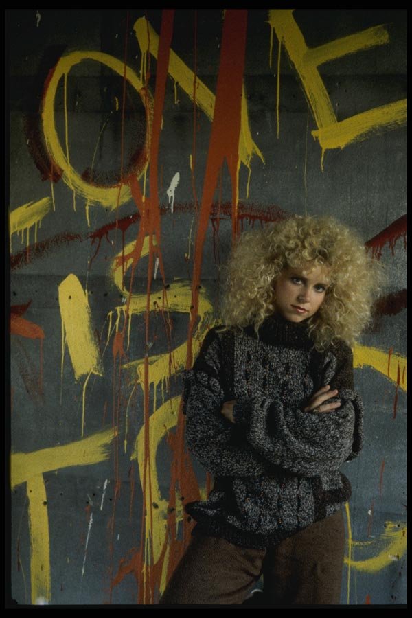 198085 Curly Blonde Hair Against Graffiti Wall A4 Photo Print