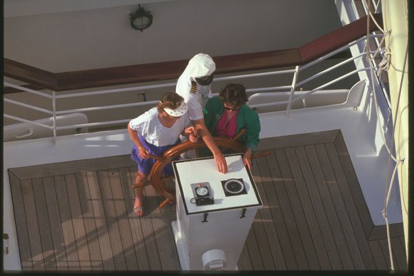 204015 Passengers Try Their Hands At The Wheel With The Captain A4 Photo Print