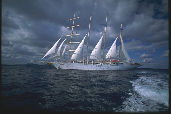 204032 Sails Are Lowered As The Harbor Approaches A4 Photo Print