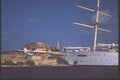 204034 Sails Down, Motoring Past The Portoferraio Lighthouse A4 Photo Print
