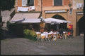 204056 Sidewalk Cafes Surround The Town Square A4 Photo Print