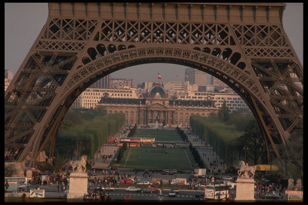 205001 Paris Through Massive Legs Of Eiffel Tower A4 Photo Print