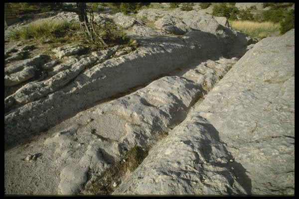 216056 Deep Ruts From Wagon Wheels In Stone Pathway A4 Photo Print