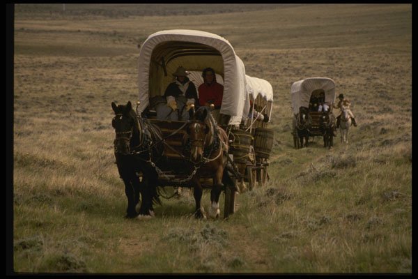 216074 Wagon Train Rolling Across Prairie Near Casper A4 Photo Print