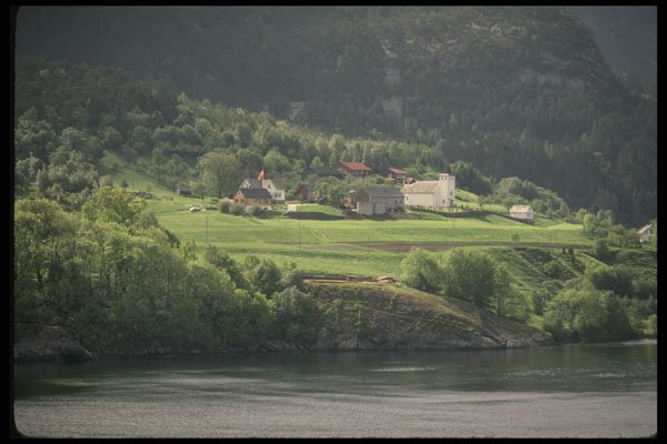 219017 Village Facing A Fjord A4 Photo Print