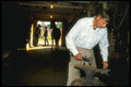 220057 Blacksmith Preparing Shoe For Customer In Background A4 Photo Print