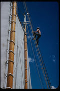 228013 Man Climbing Rigging On Coastal Schooner A4 Photo Print