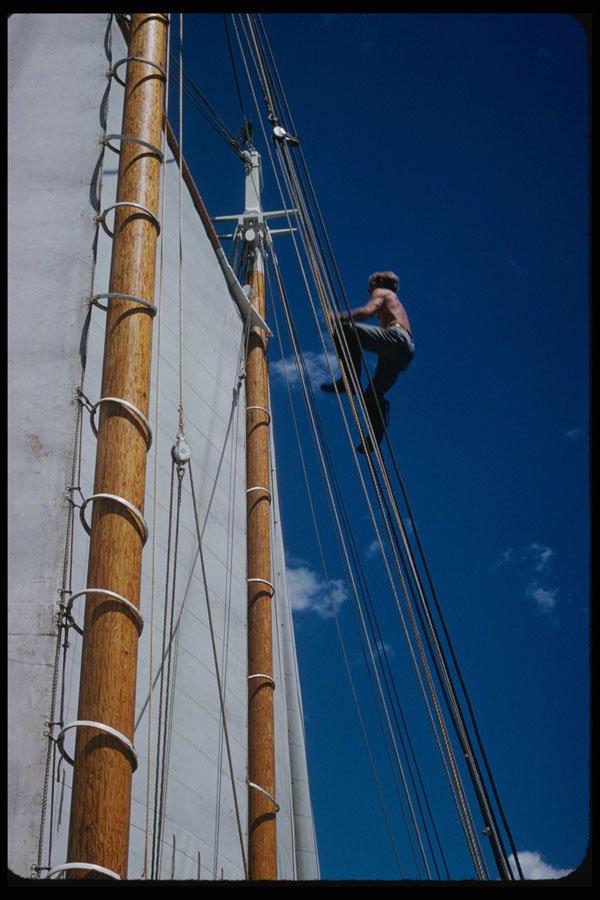 228013 Man Climbing Rigging On Coastal Schooner A4 Photo Print
