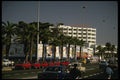 229016 The Coastal Boulevard Is Lined With Palm Trees And Hotels A4 Photo Print