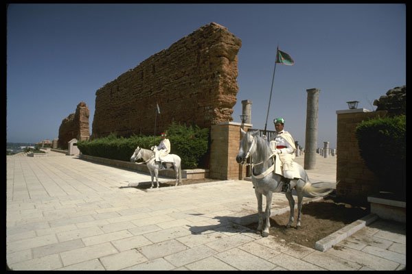 229028 Ancient Almohad City Walls And Mounted Guards A4 Photo Print