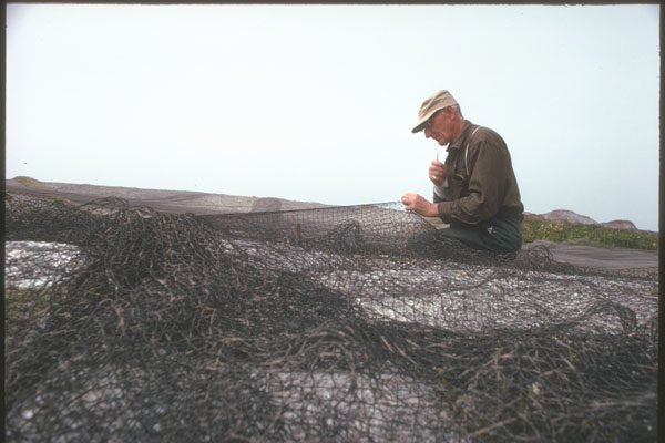 230084 Cape Breton Fisherman Mending Net, Nova Scotia A4 Photo Print