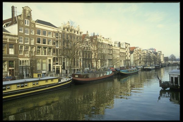 235002 Canal With Ships Used For Housing, Amsterdam A4 Photo Print